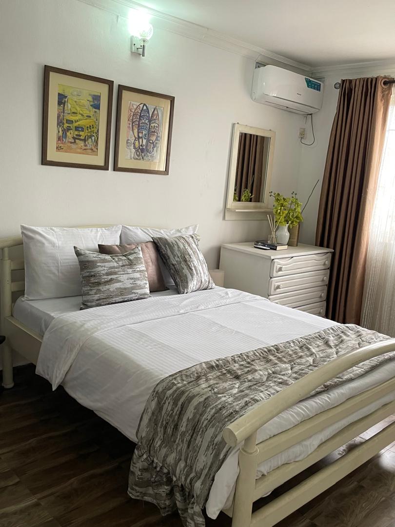 Luxury vintage bedroom at Wolban Short Lets